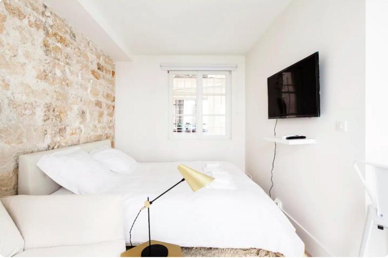 Cmg Saint Paul / Rivoli V Apartment Paris Bagian luar foto
